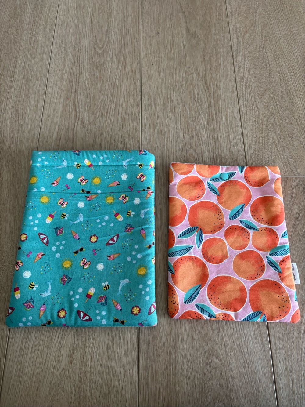 Set of Two Reusable Fabric booksleeves - Teal Beach & Orange Citrus Prints